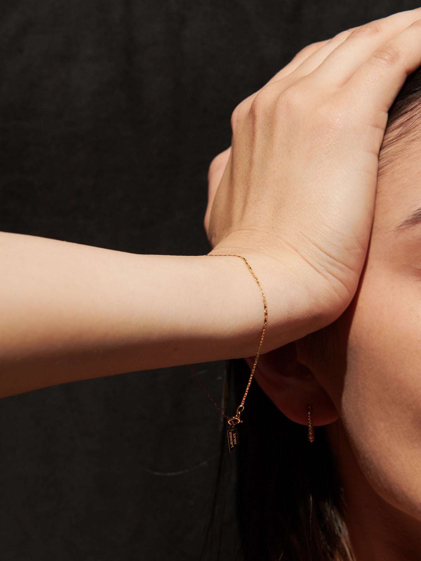 10kt Yellow Gold Valentino Chain Bracelet pictured on model.