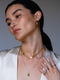 Chainmail necklace pictured with toggle in the front on model. 