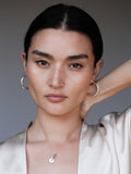 Mini Sterling Silver Disk & Toggle Necklace pictured on model. 