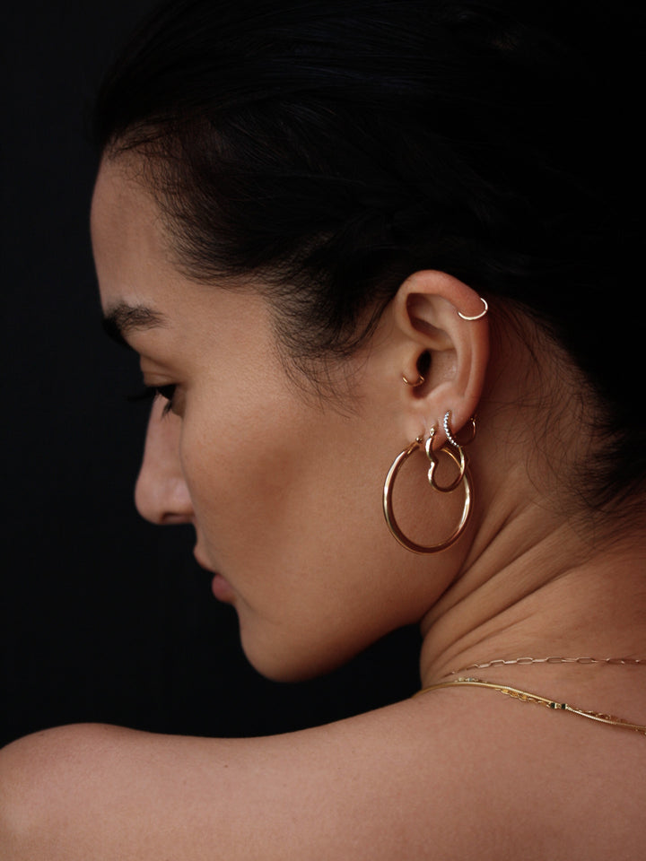 Xl Heart Feels Hoops pictured on model. 