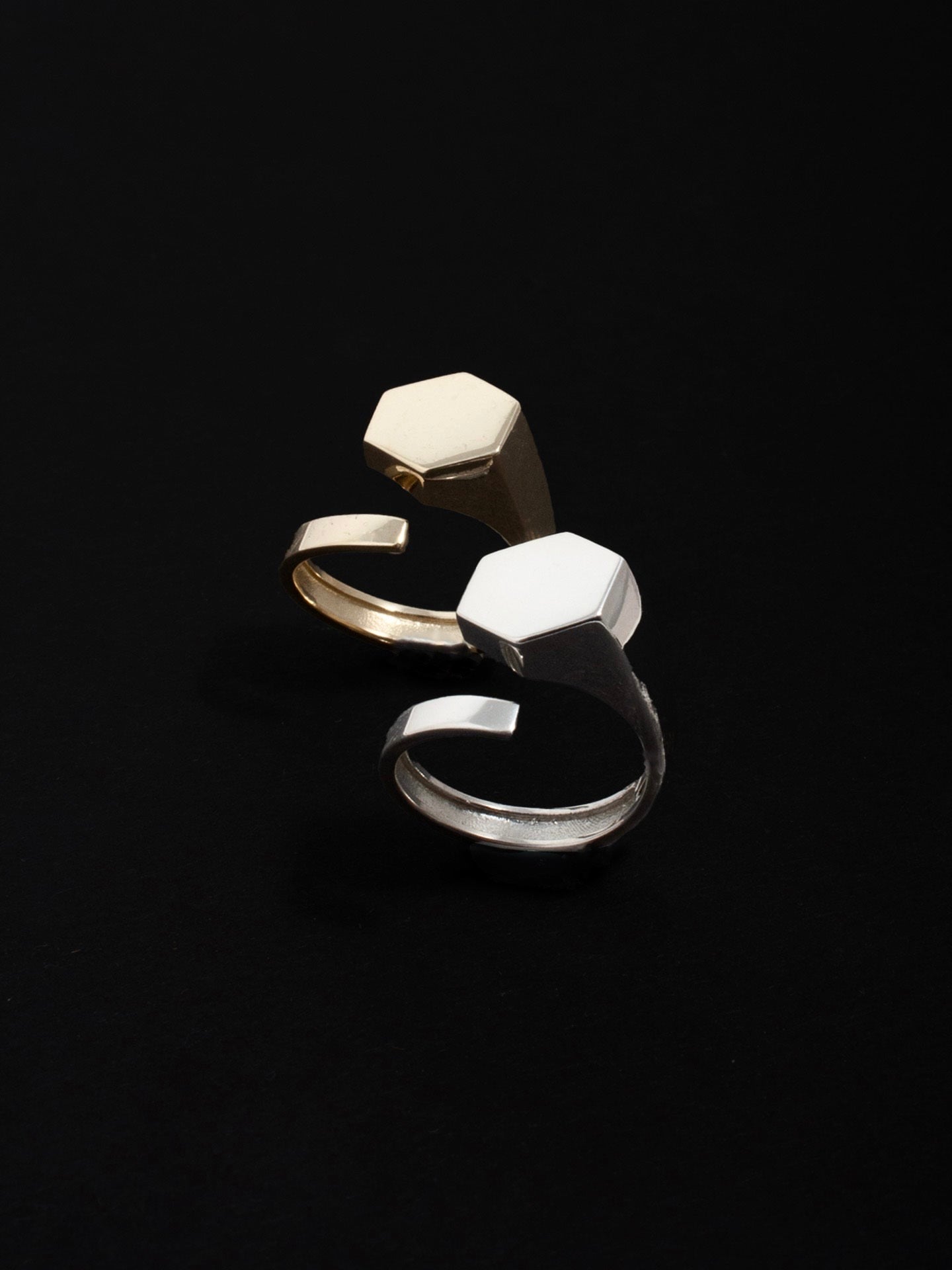 Hexagon ID Signet pictured with the Sterling Silver model on black background. 
