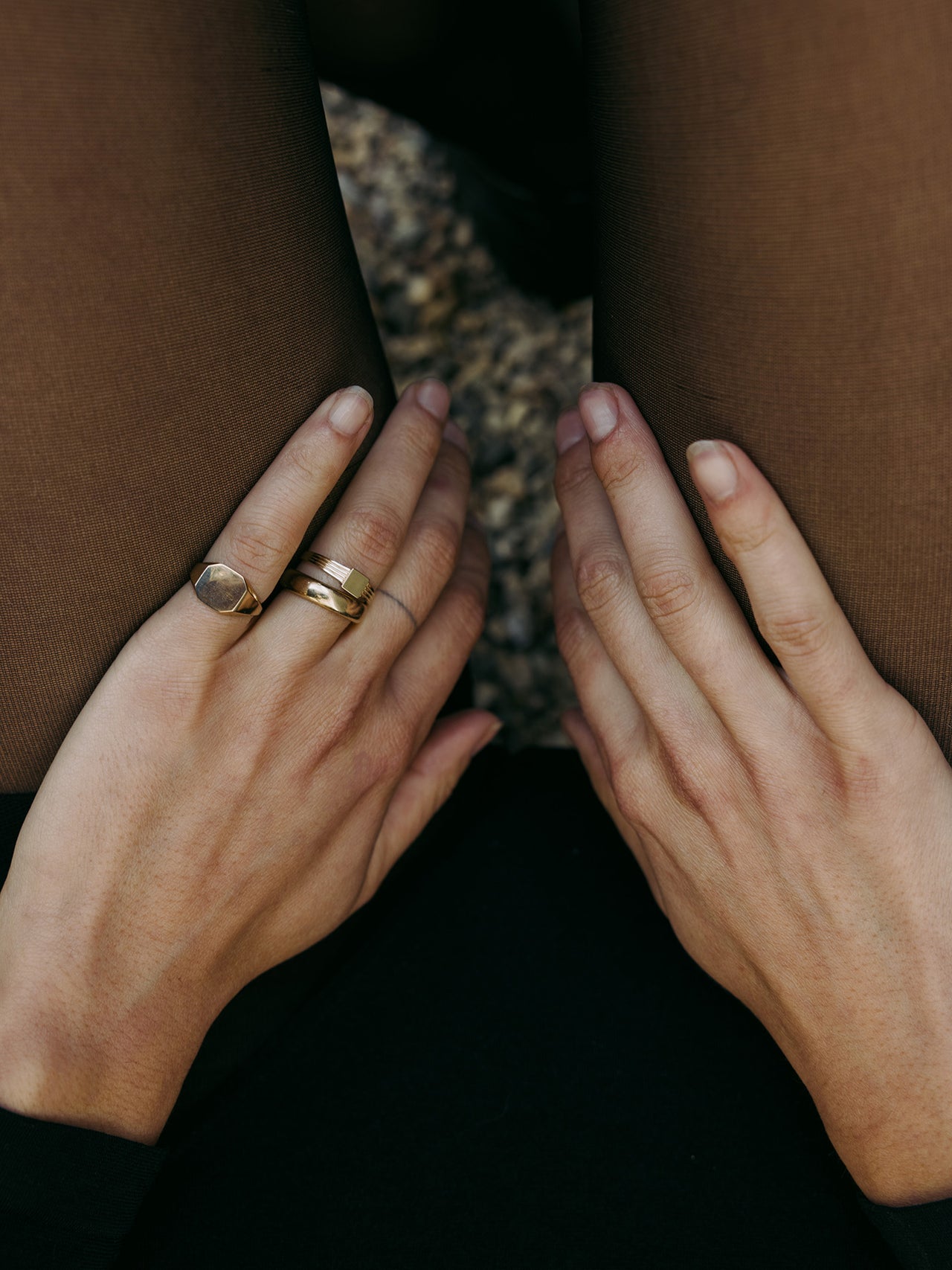 10kt Yellow Gold Octagonal Signet pictured on models pinky finger.
