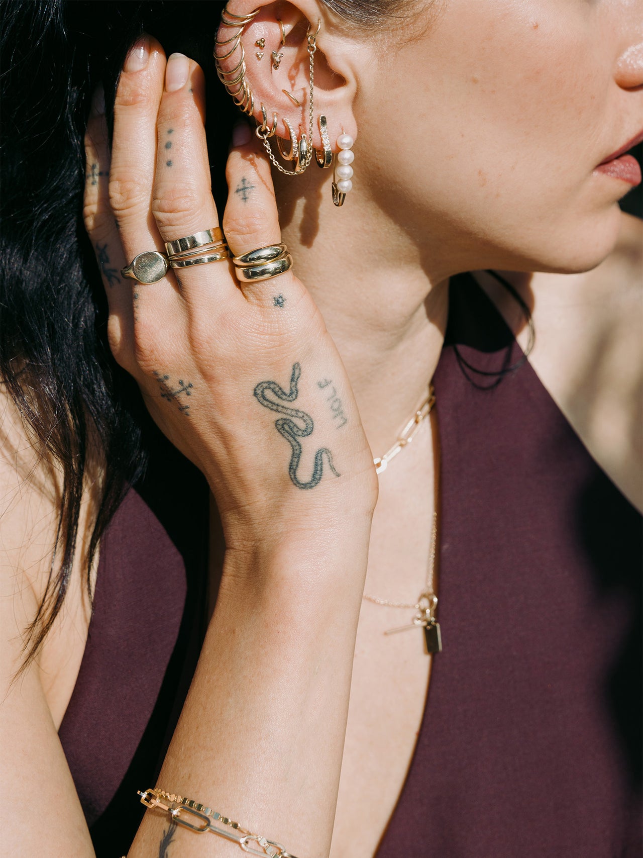 14kt Yellow Gold Pave Hoops pictured in models fourth piercing. 