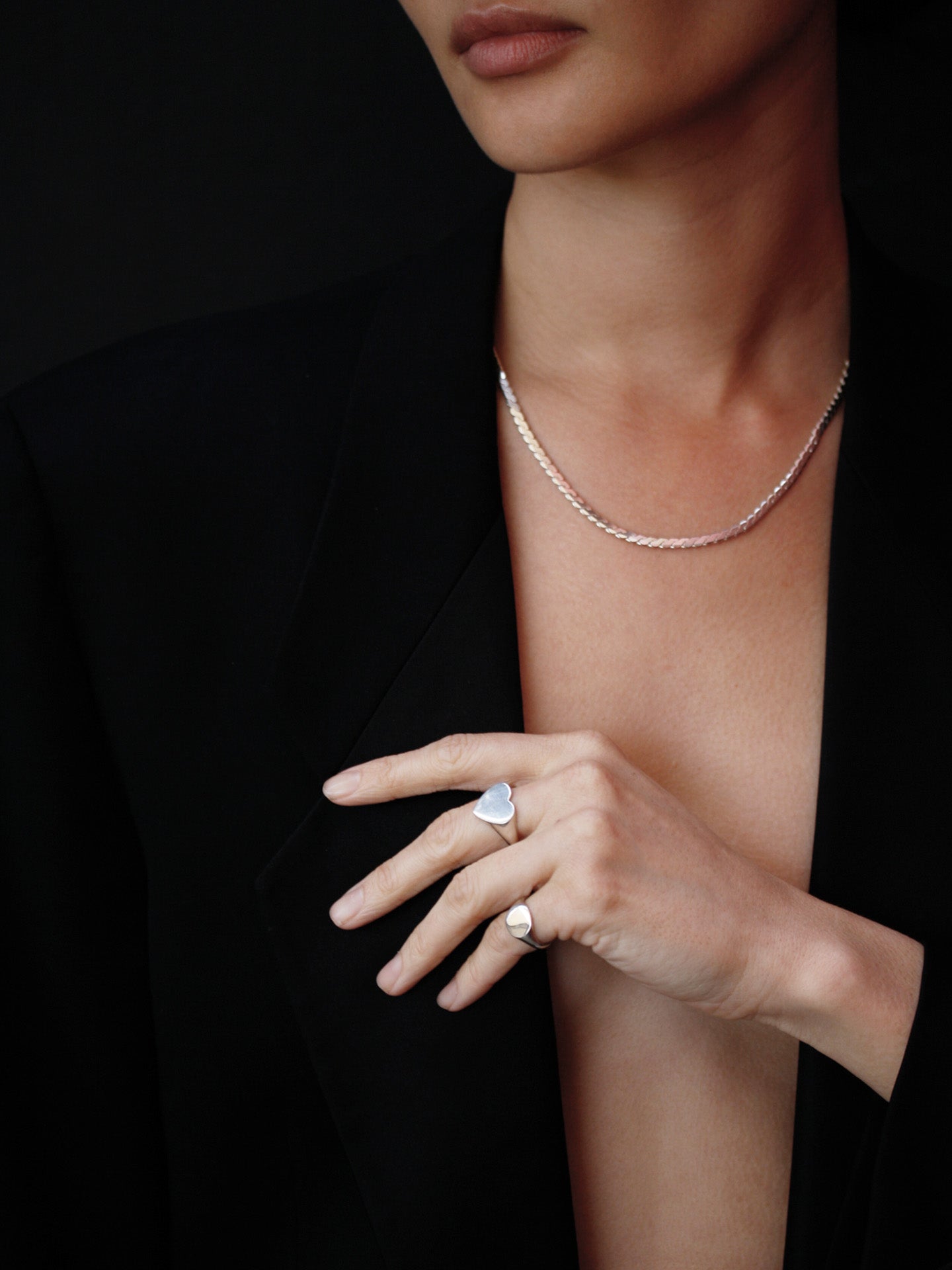 Serpentine Chain pictured in sterling silver on model. 