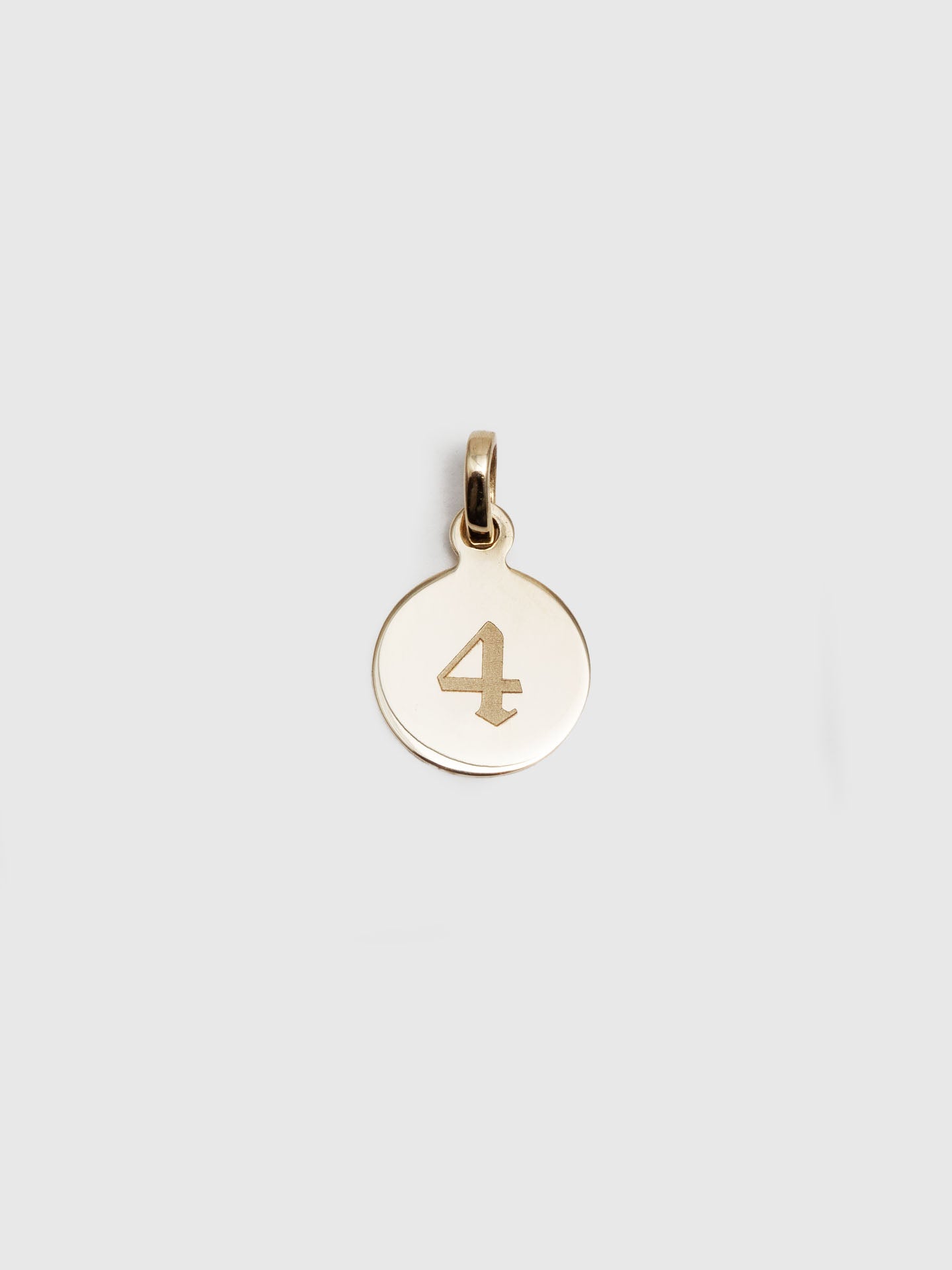 14Kt Yellow Gold Mini Disk Pendant engraved with the letter '4' in Gothic font. 