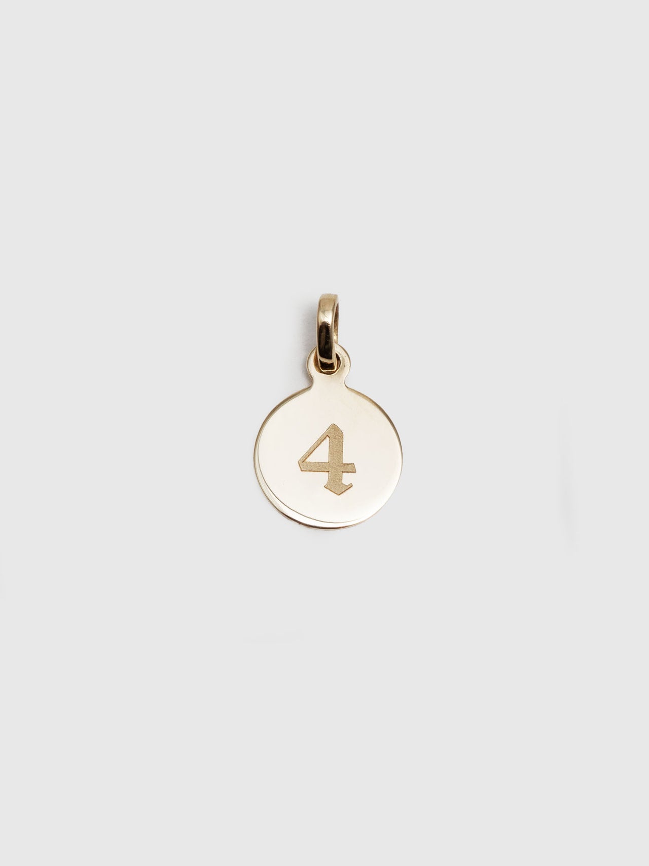 14Kt Yellow Gold Mini Disk Pendant engraved with the letter '4' in Gothic font. 