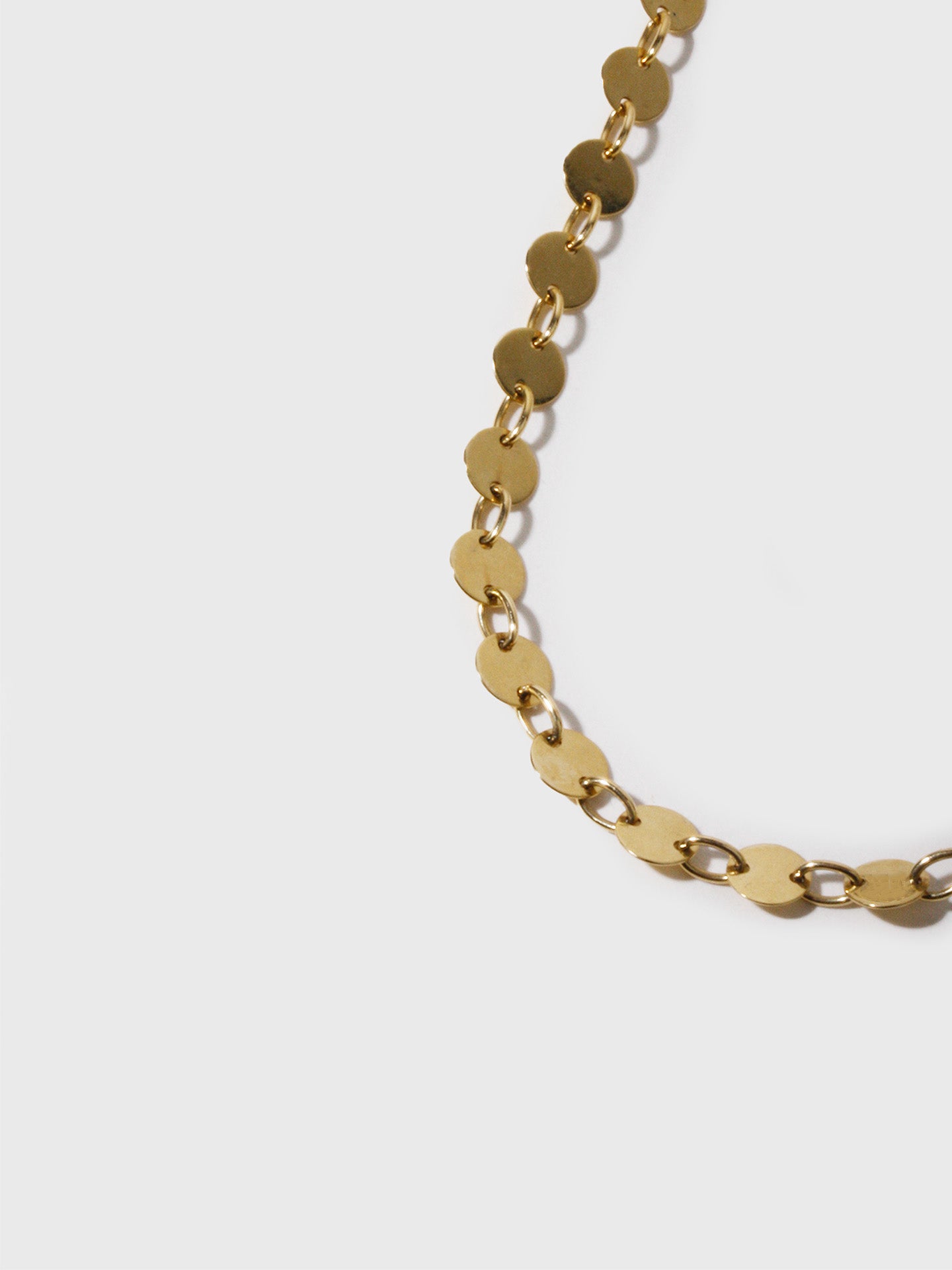 Caviar Chain Necklace shot on light grey background.