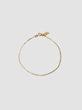 10kt Yellow Gold Valentino Chain Bracelet pictured on light grey background.