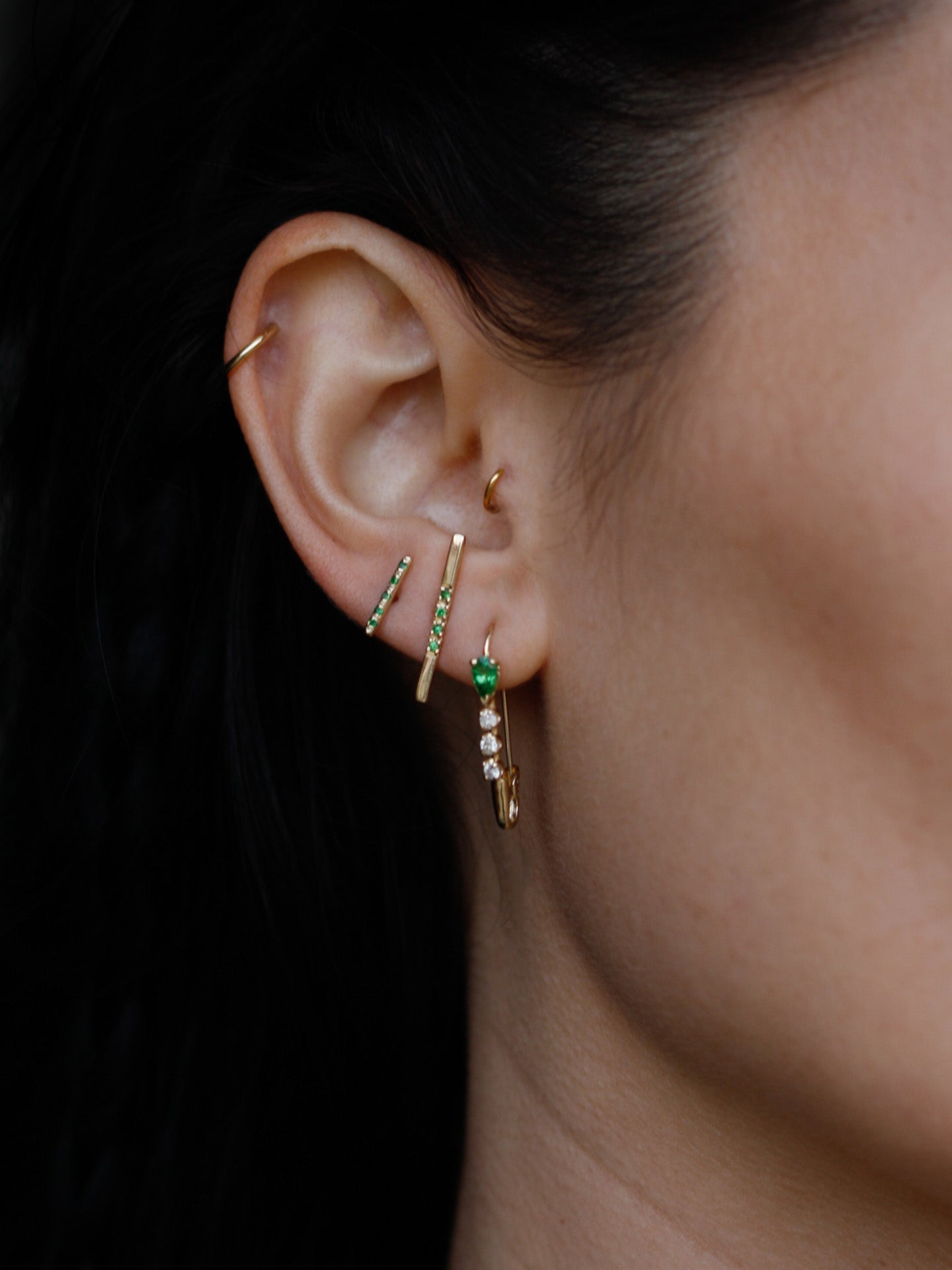 14kt Yellow Gold Gemstone Long Rod Stud shot on model.