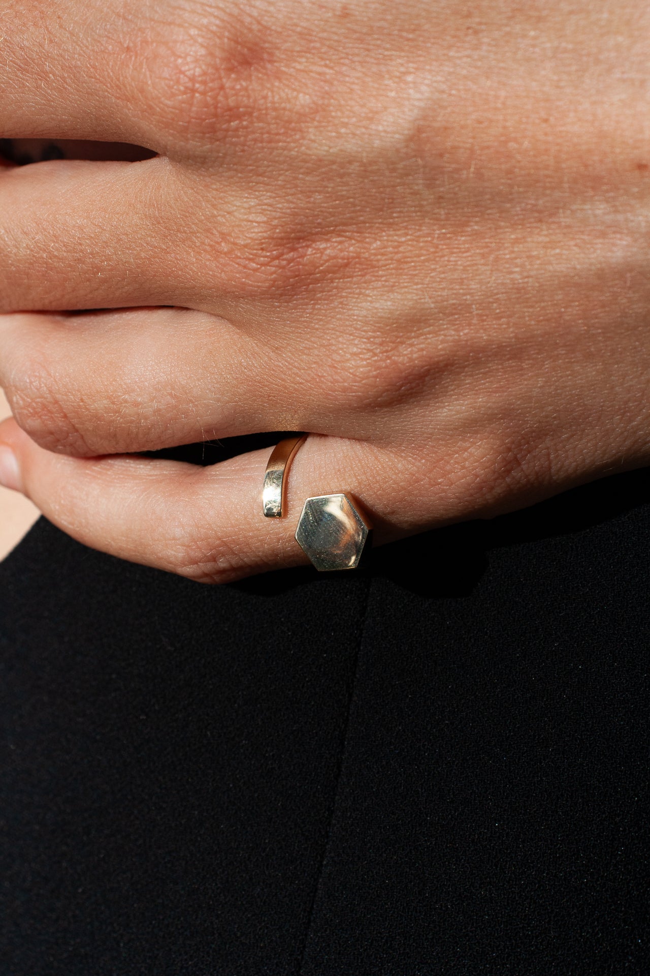 Hexagon ID Signet pictured on models pinky finger. 