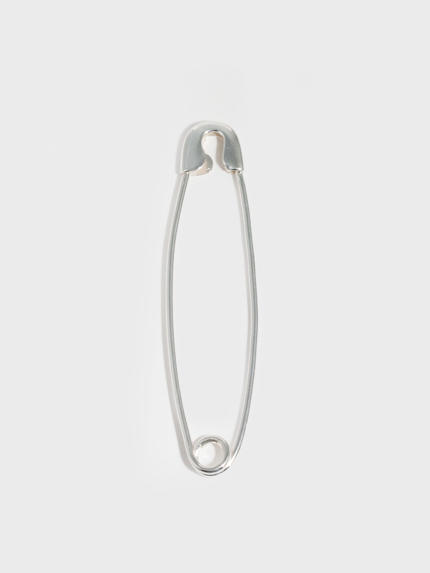 Jumbo Safety Pin pictured on light grey background. 