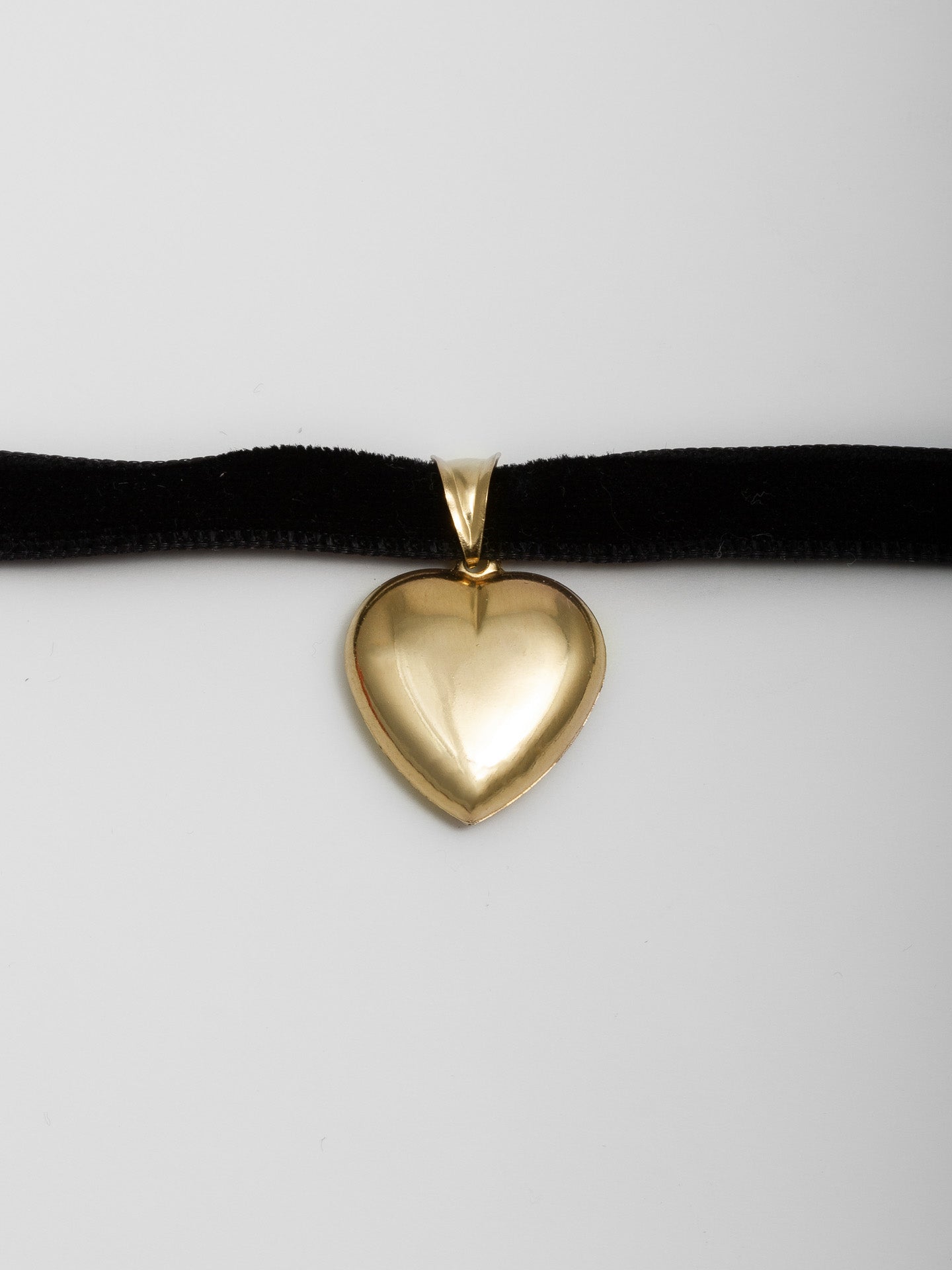 XL Puff Love Necktie shot on Velvet Cord on white back drop.