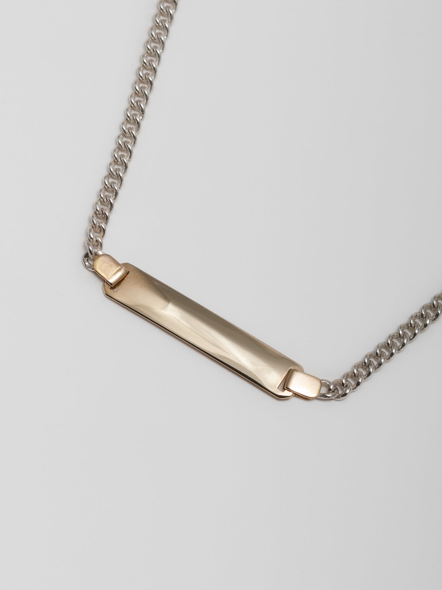 Mini Watts I.D. Necklace shot on white background.