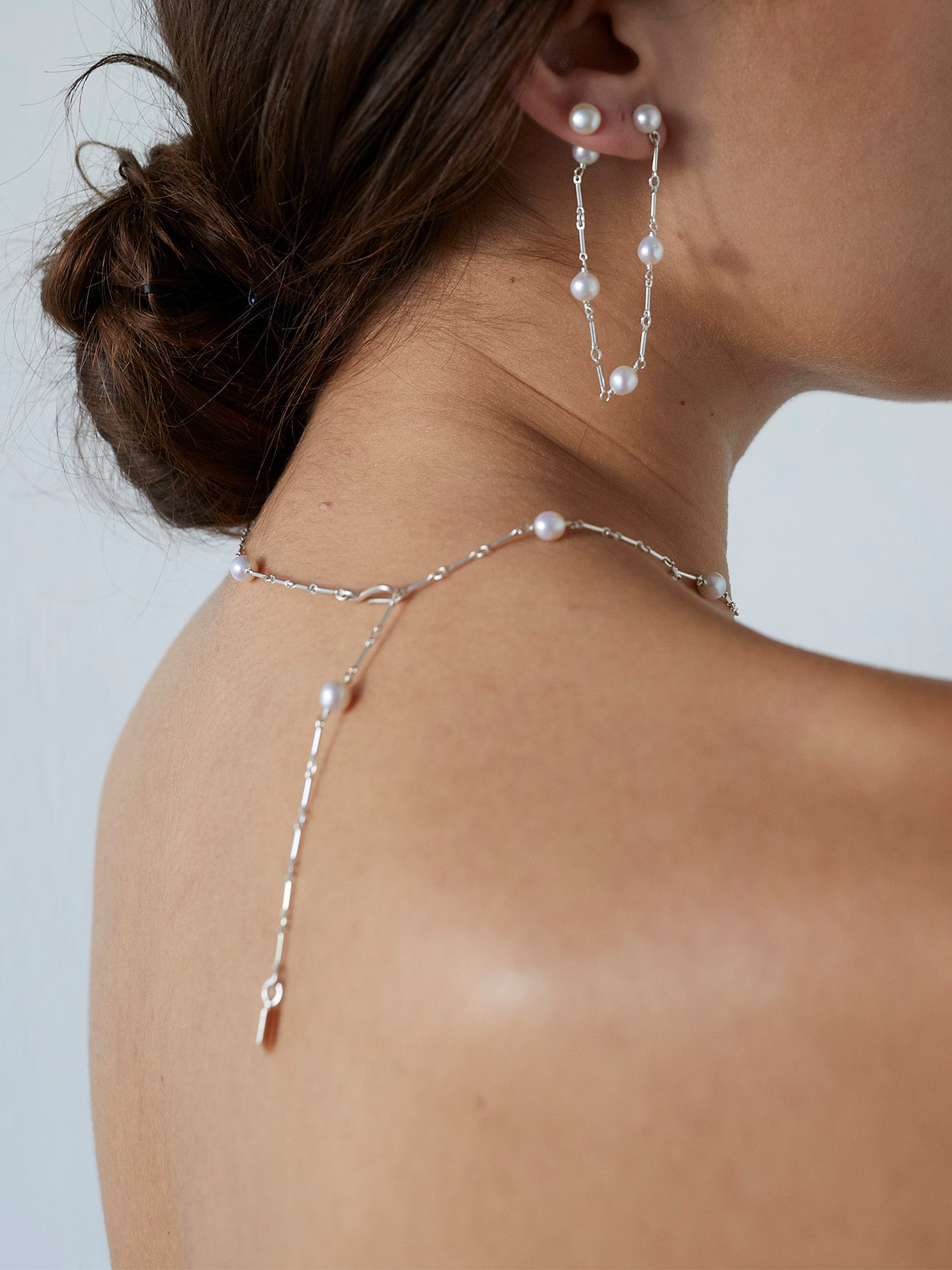 Freshwater Pearl Studs pictured in models second piercing. 
