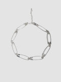 Sterling Silver Safety Pin Link Chain pictured on light grey background. 