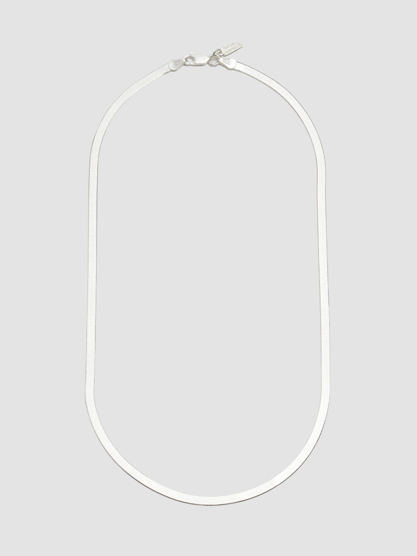 Sterling Silver Herringbone Chain Necklace pictured on light grey background