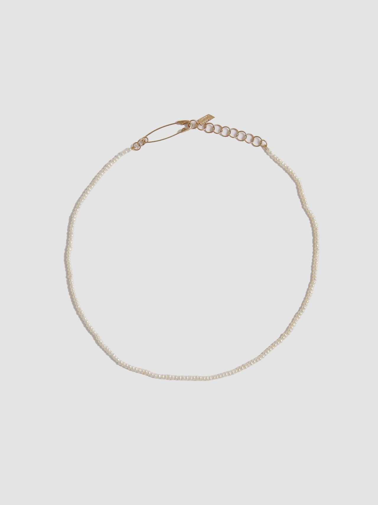 2.5mm Freshwater Pearls with 14Kt Yellow Gold Safety Pin Closure
