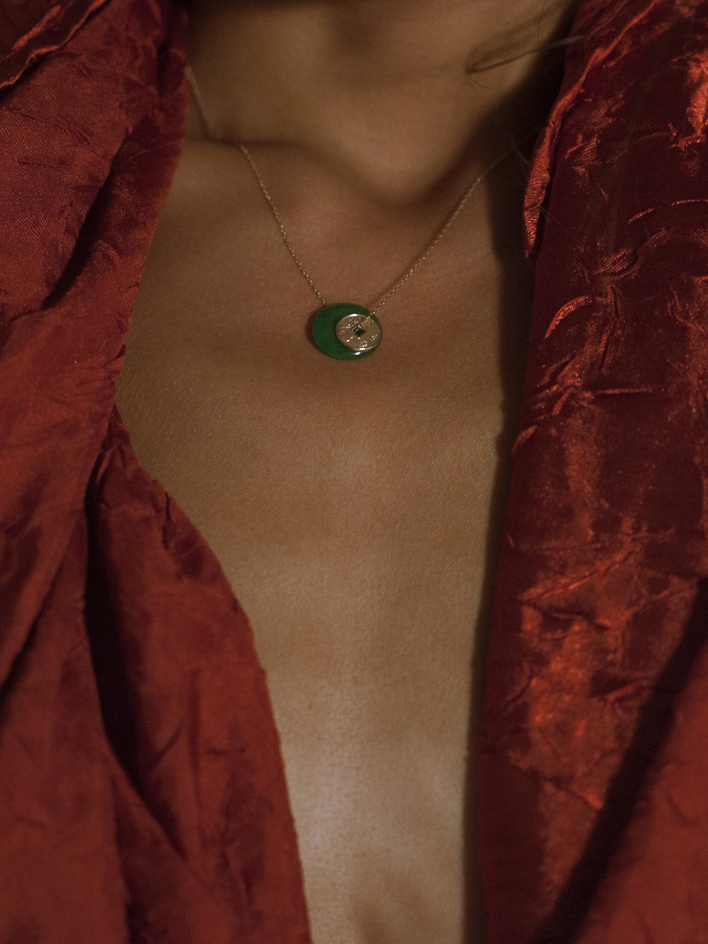 14kt Yellow Gold Jade Coin Necklace pictured on model. 