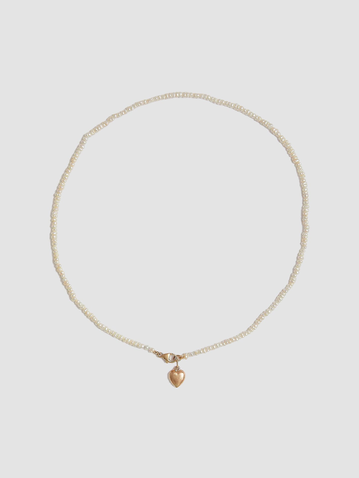 Puff Love Choker pictured on light grey background.