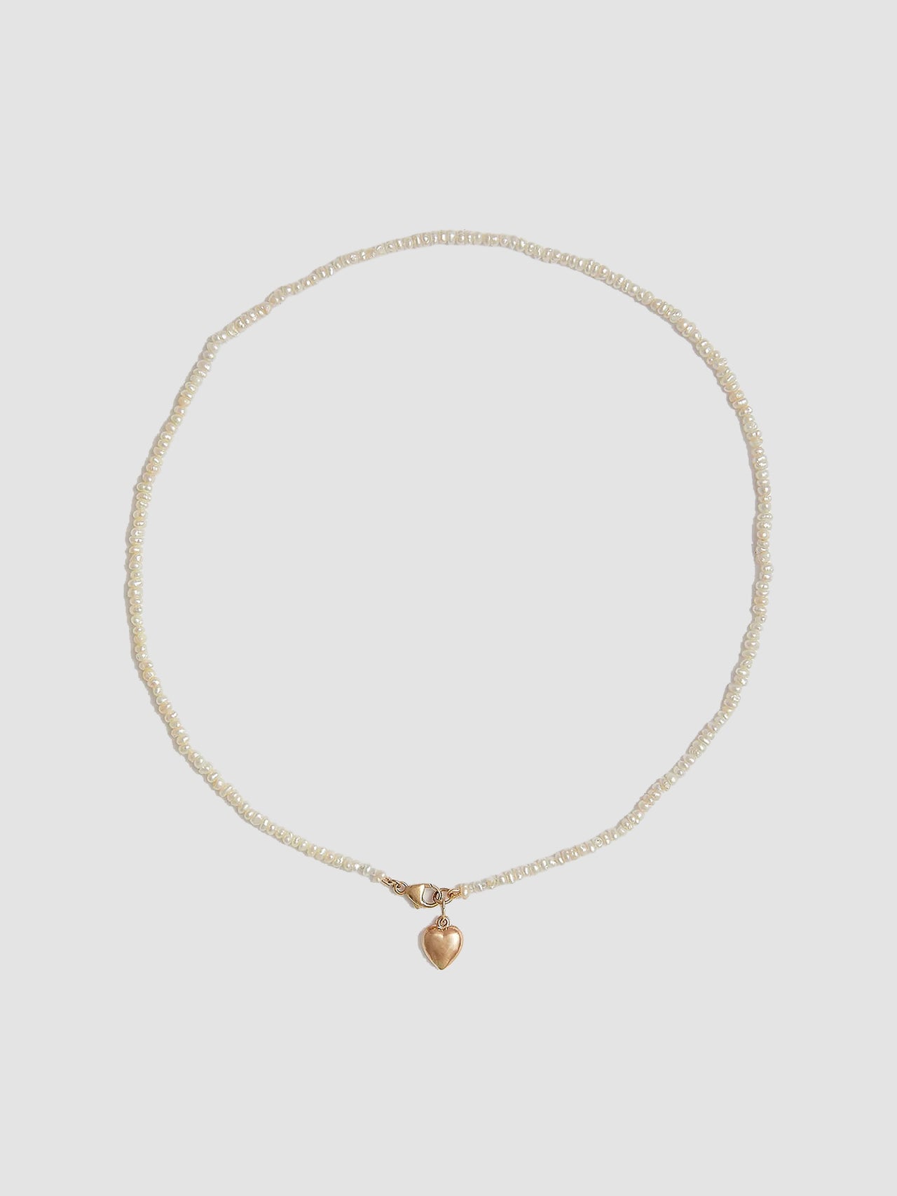 Puff Love Choker pictured on light grey background.