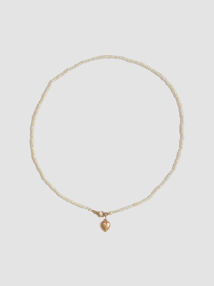 Puff Love Choker pictured on light grey background.