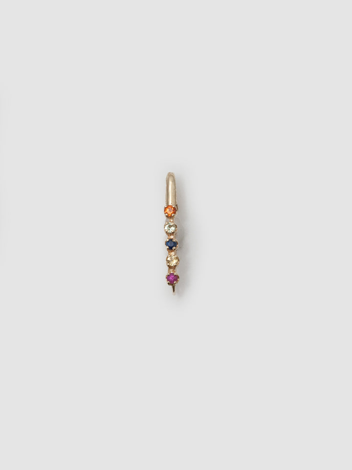 14kt Yellow Gold Sunset Safety Pin pictured on light grey background. 