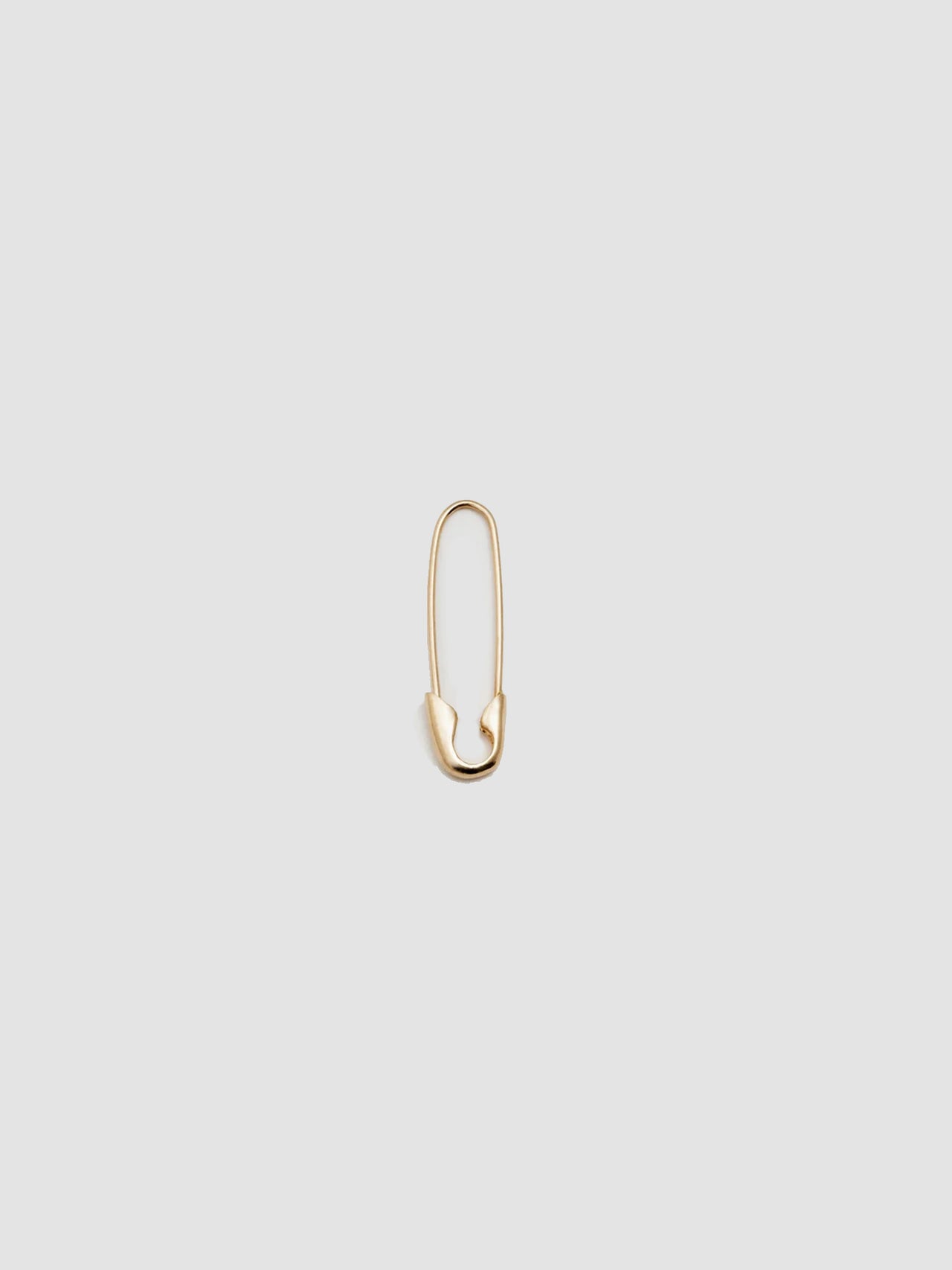 Product shot of the Safety Pin Earring (14Kt Shiny Yellow Gold Safety Pin Earring  Length: 21.35mm) Background: Grey backdrop