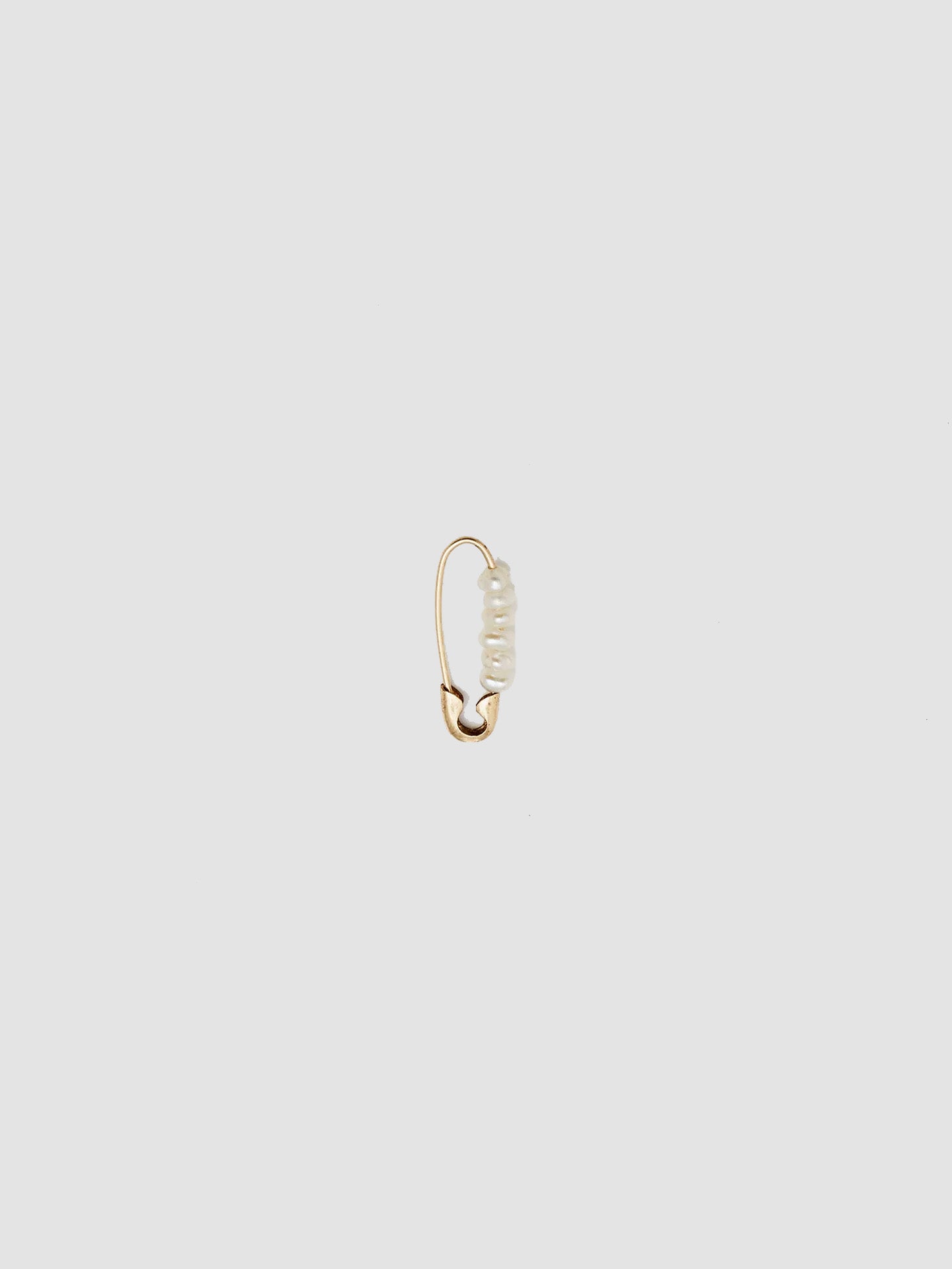 Mini Friendship Safety Pin pictured on light grey background.