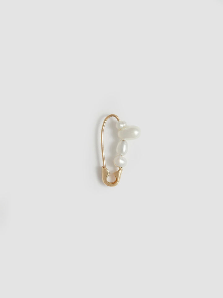 Product shot of the Mini Mixed Pearl Safety Pin Earring (14kt Yellow Gold Mixed Pearl Safety Pin Length: 17mm Mixed Freshwater Pearls) Background: Grey Backdrop