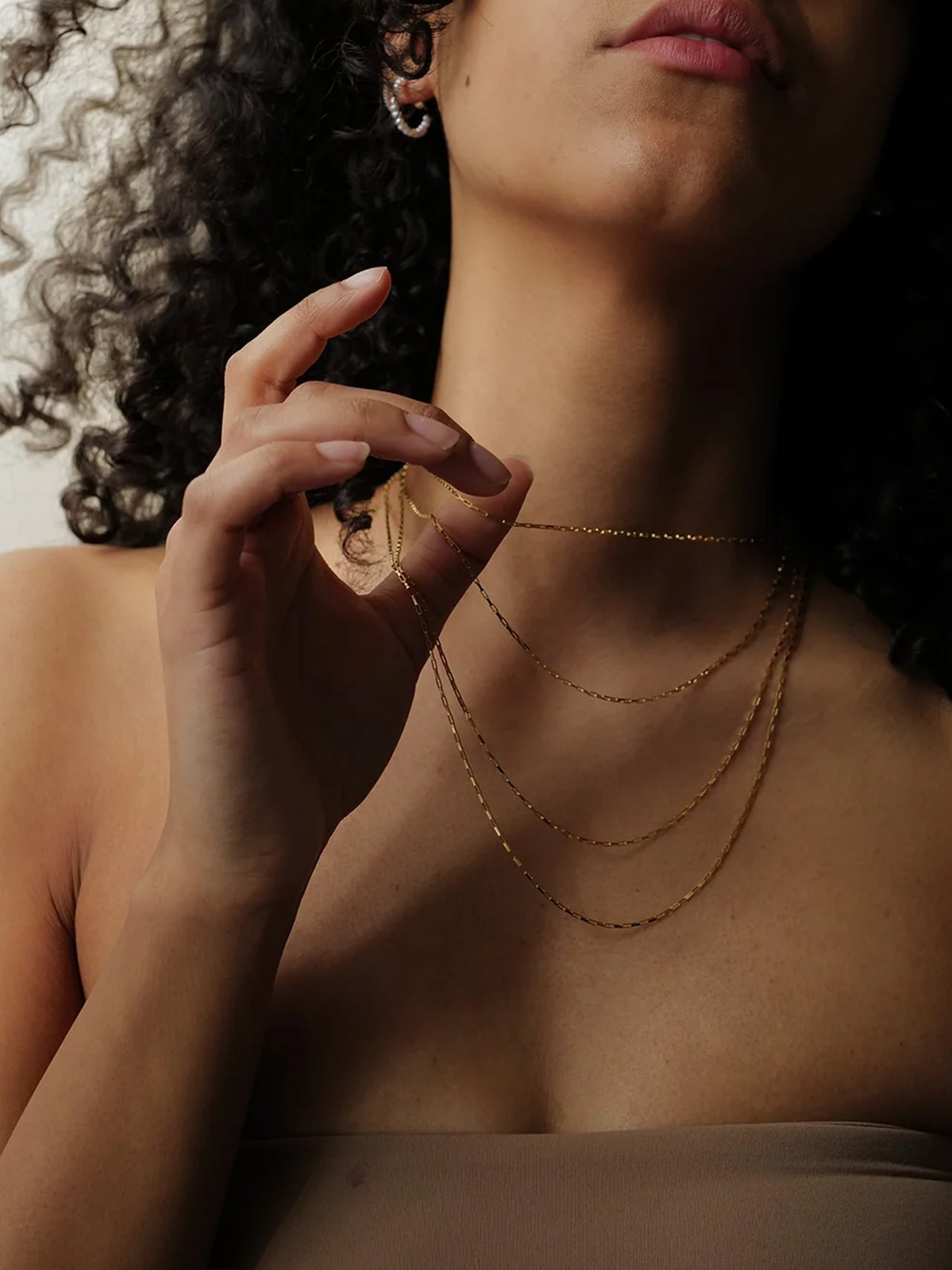 on model imagery of yellow gold petite industrial box link chain