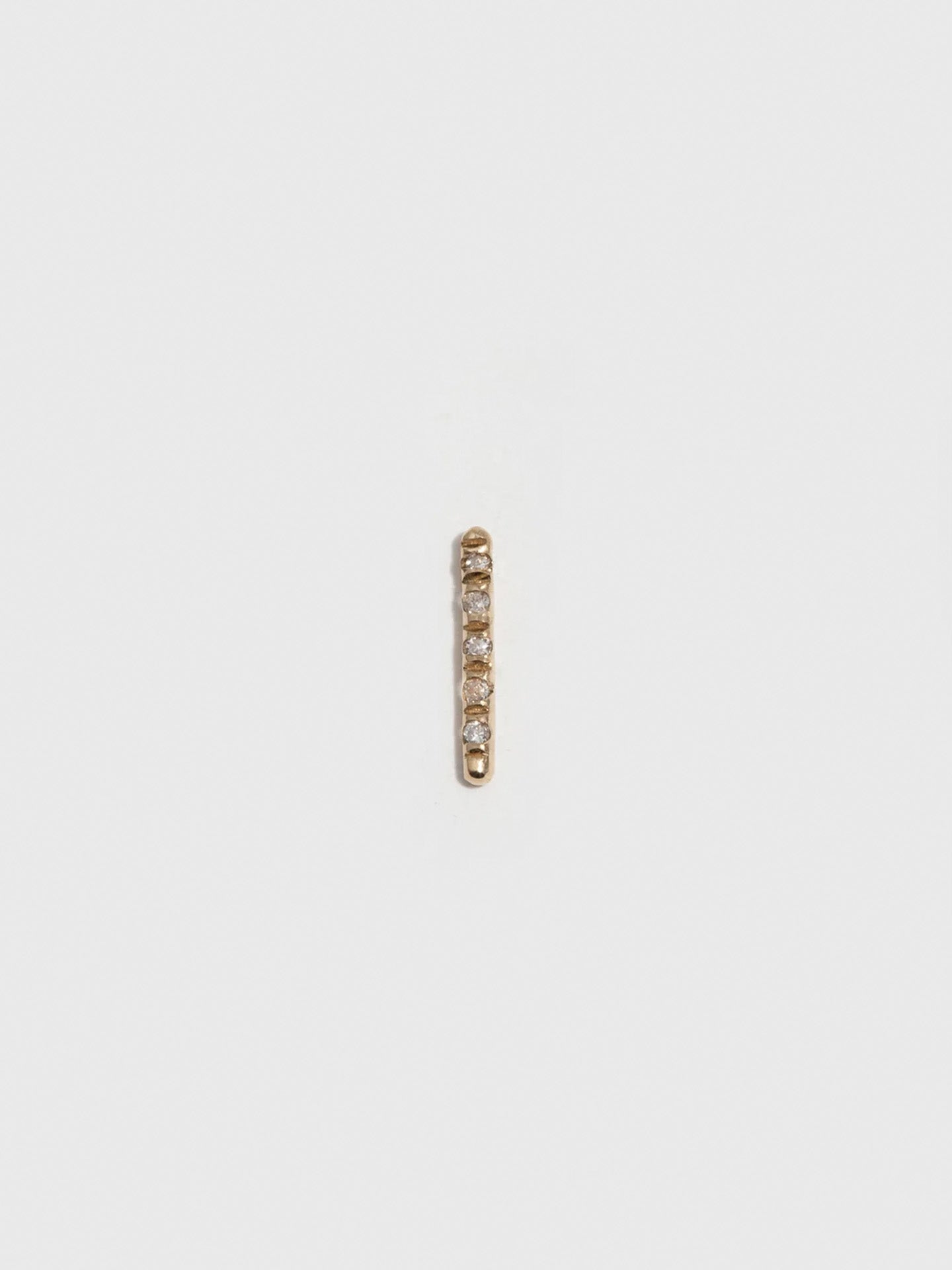 14kt Yellow Gold Solo Diamond Rod Stud Earring pictured on light grey background. Single.