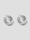 Product shot of the XL Dome Hoops(Sterling Silver Hoop Earrings 30mm Diameter 12mm Wide) Background: Grey backdrop