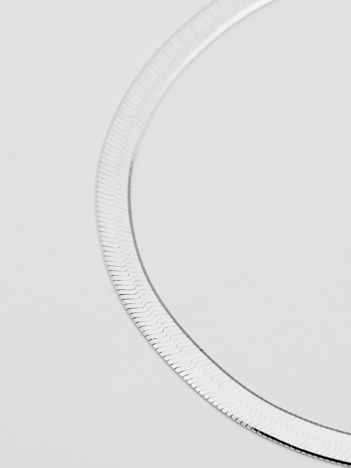Sterling Silver Herringbone Bracelet: Sterling Silver Herringbone Chain Bracelet  Length: 7”  Width: 3.5mm