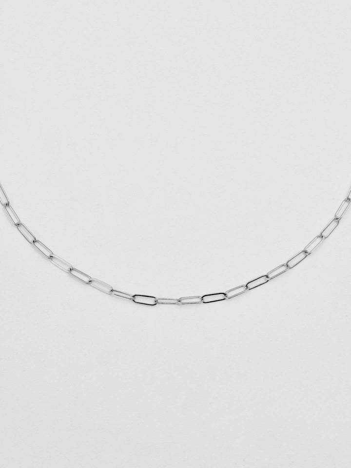Close up picture of the Sterling Silver Lightweight Long Link Chain pictured on light grey background. 