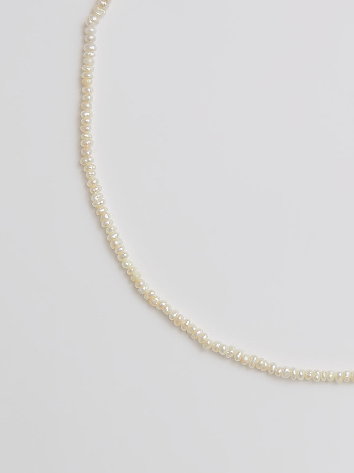 Close up of Fresh Water Pearl Bead Strand on Puff Love Choker