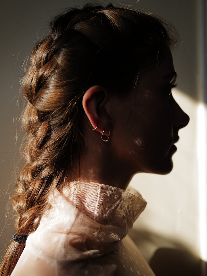 Heart Feels Hoops shot on models ear from side profile. 