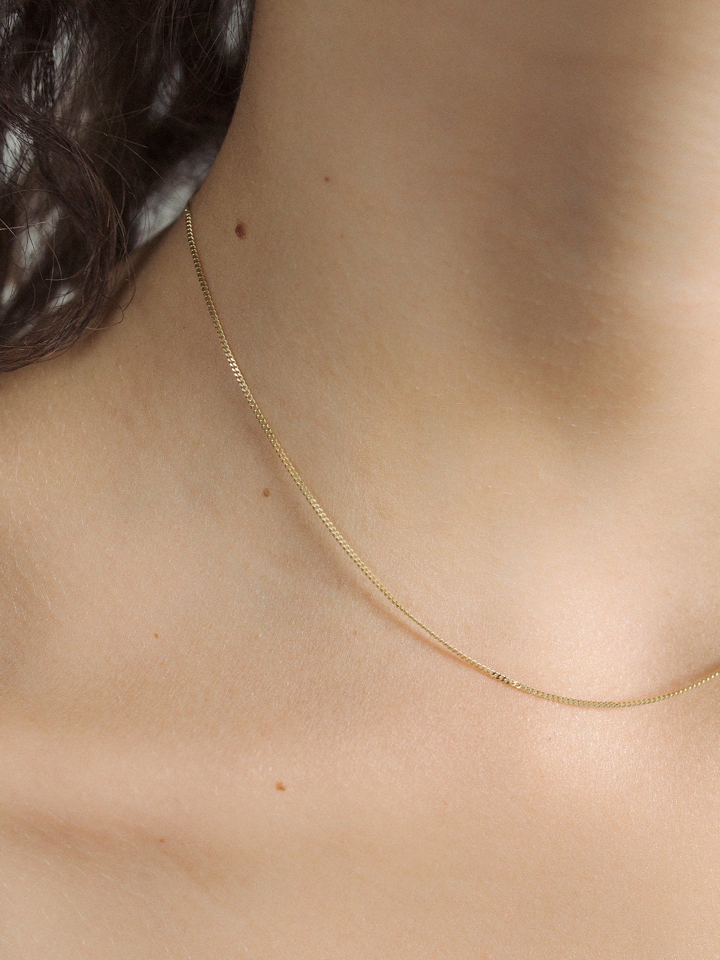 Close up of Thin Curb Chain shot on model