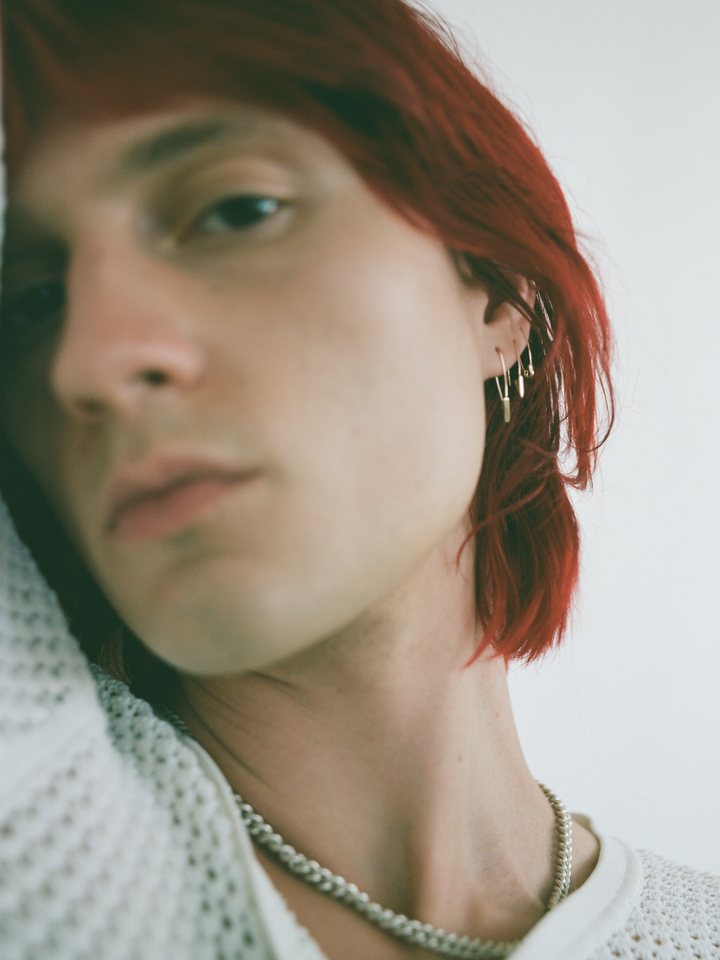 on model imagery of triangel safety pin earring